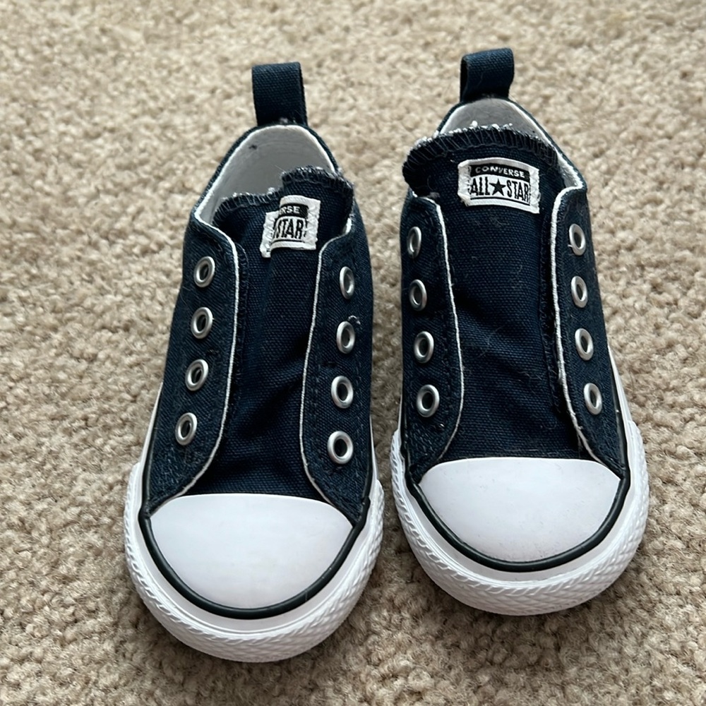 Baby/toddler Converse Allstar low tops.  Navy blue slip on with Velcro.  Size 6.